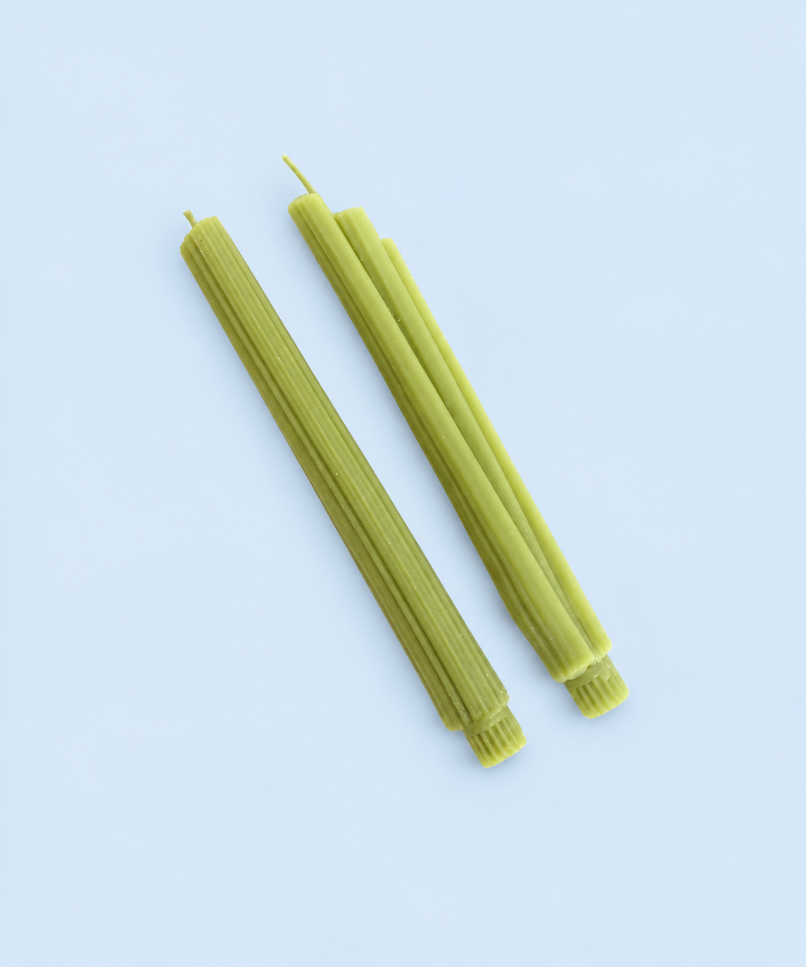 Celery-shaped beeswax taper candles in celery green from Market Mama