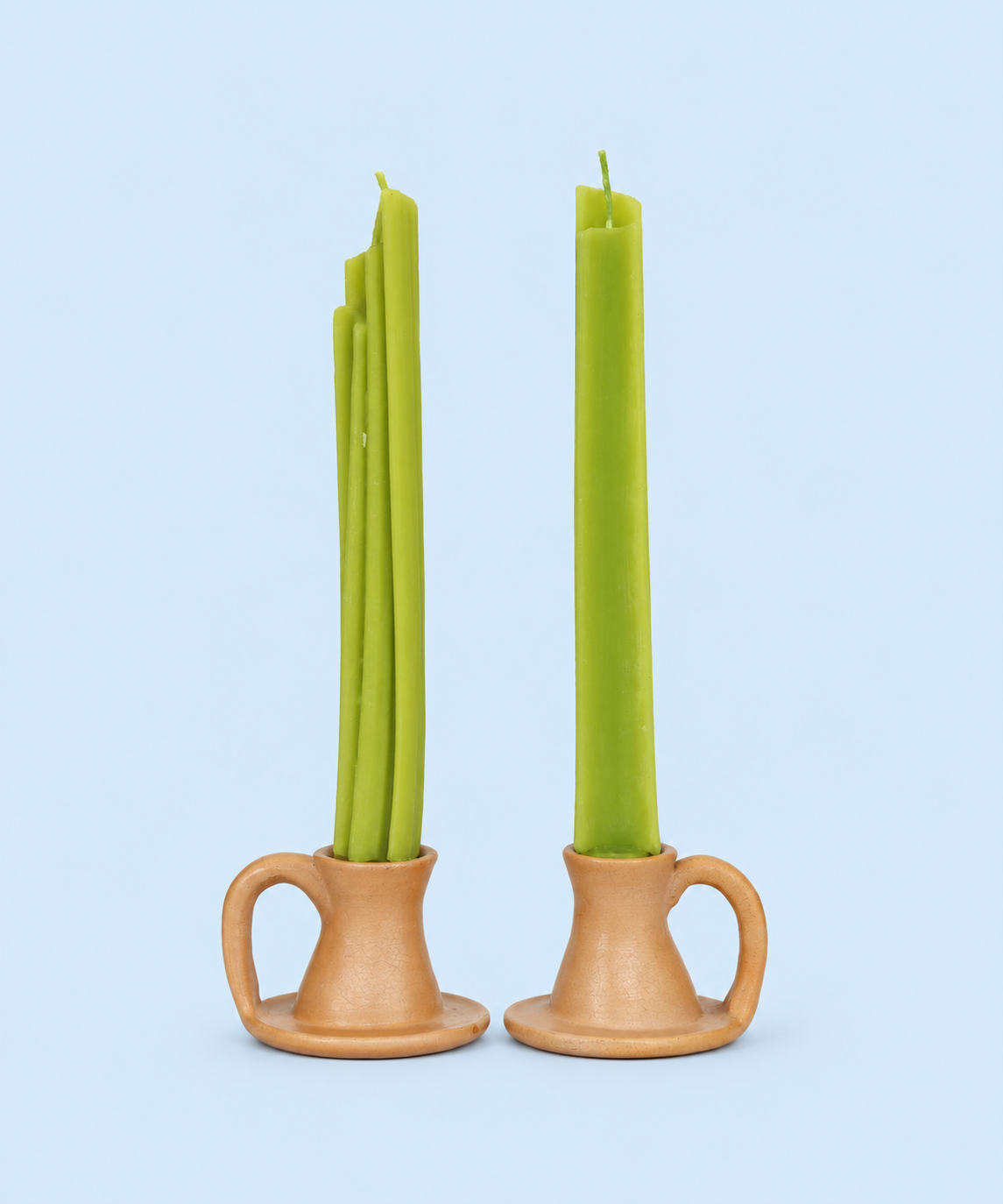Green celery taper candles made from 100% beeswax